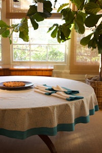 a round table with a blue and white tablecloth